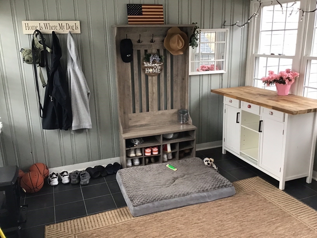 2 Coolidge Road Woburn, MA 01801 - Photo 16 of 24 a living room with furniture and a window