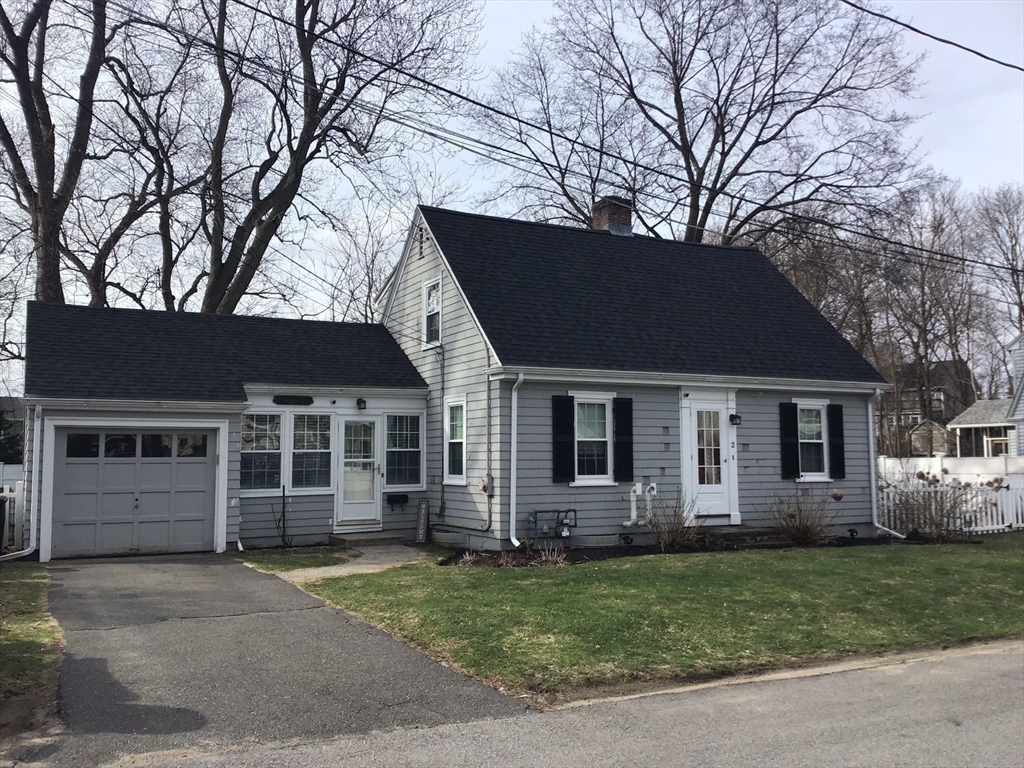2 Coolidge Road Woburn, MA 01801 - Photo 22 of 24 front view of a house with a yard