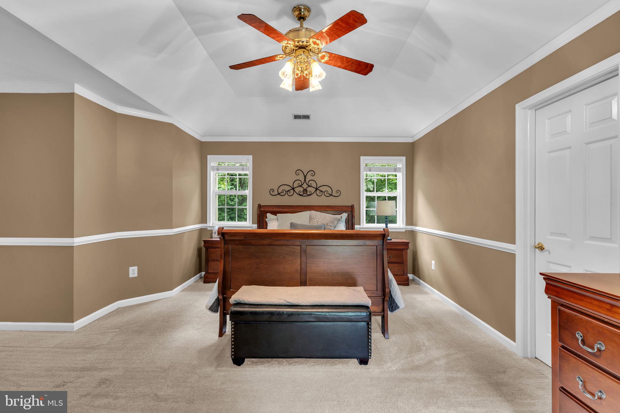 204 Walnut Creek Road Huntingtown, MD 20639 - Photo 24 of 59 a bedroom with furniture and window
