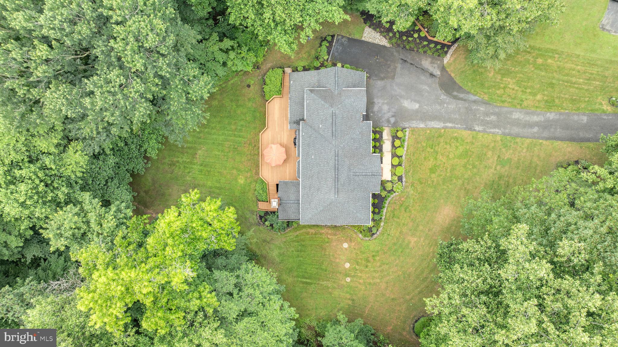 204 Walnut Creek Road Huntingtown, MD 20639 - Photo 3 of 59 an aerial view of a house with a yard
