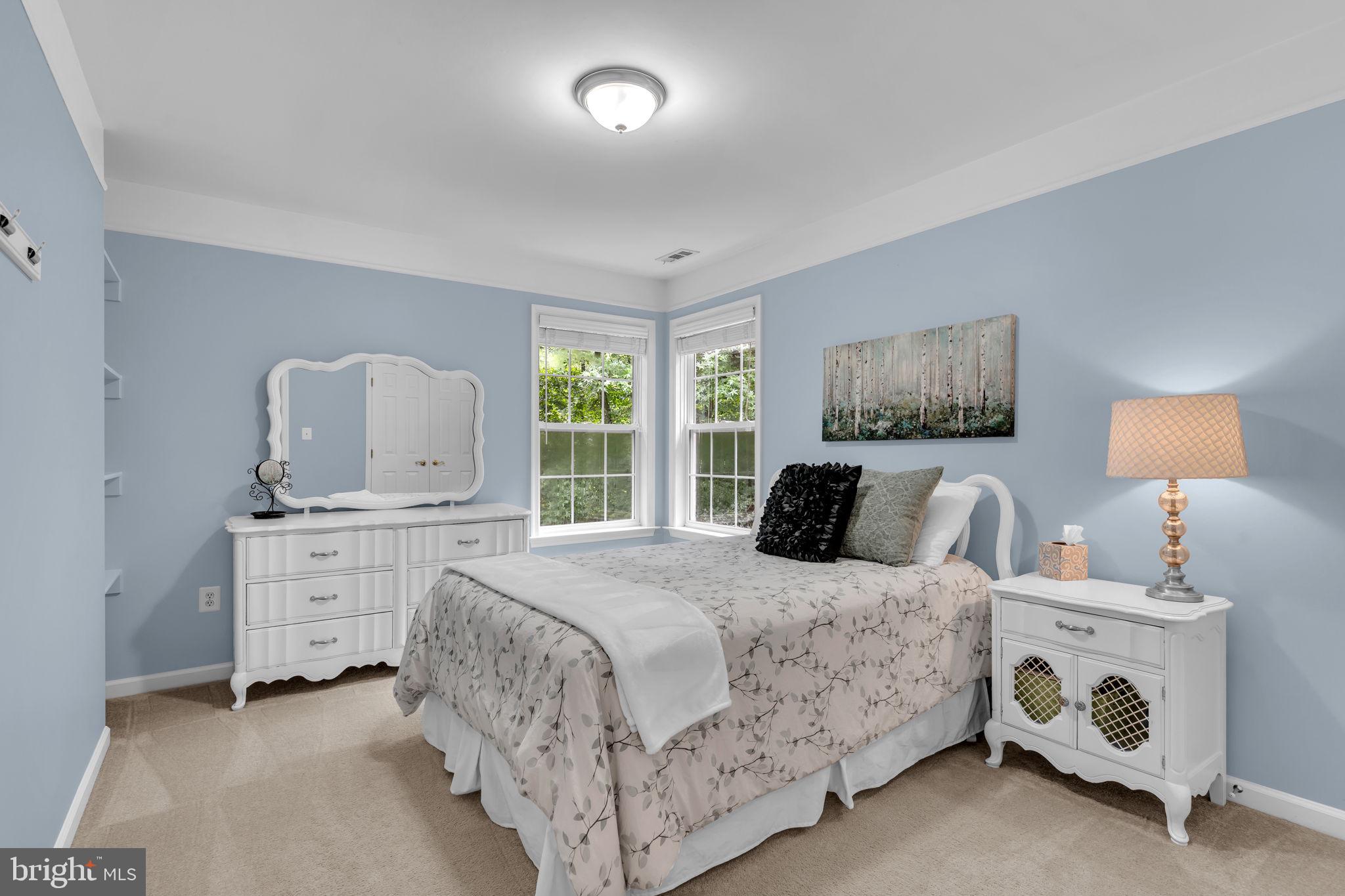 204 Walnut Creek Road Huntingtown, MD 20639 - Photo 32 of 59 a bedroom with a bed and a dresser