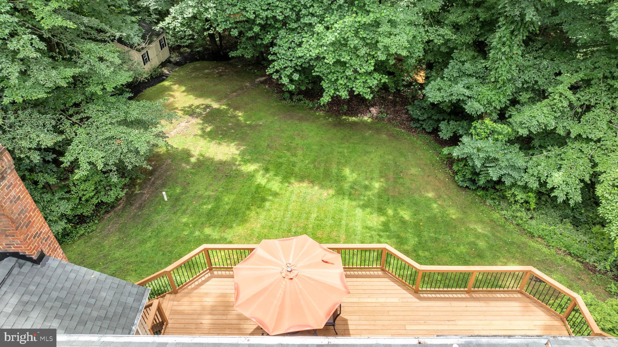 204 Walnut Creek Road Huntingtown, MD 20639 - Photo 4 of 59 a view of a wooden deck and lake view
