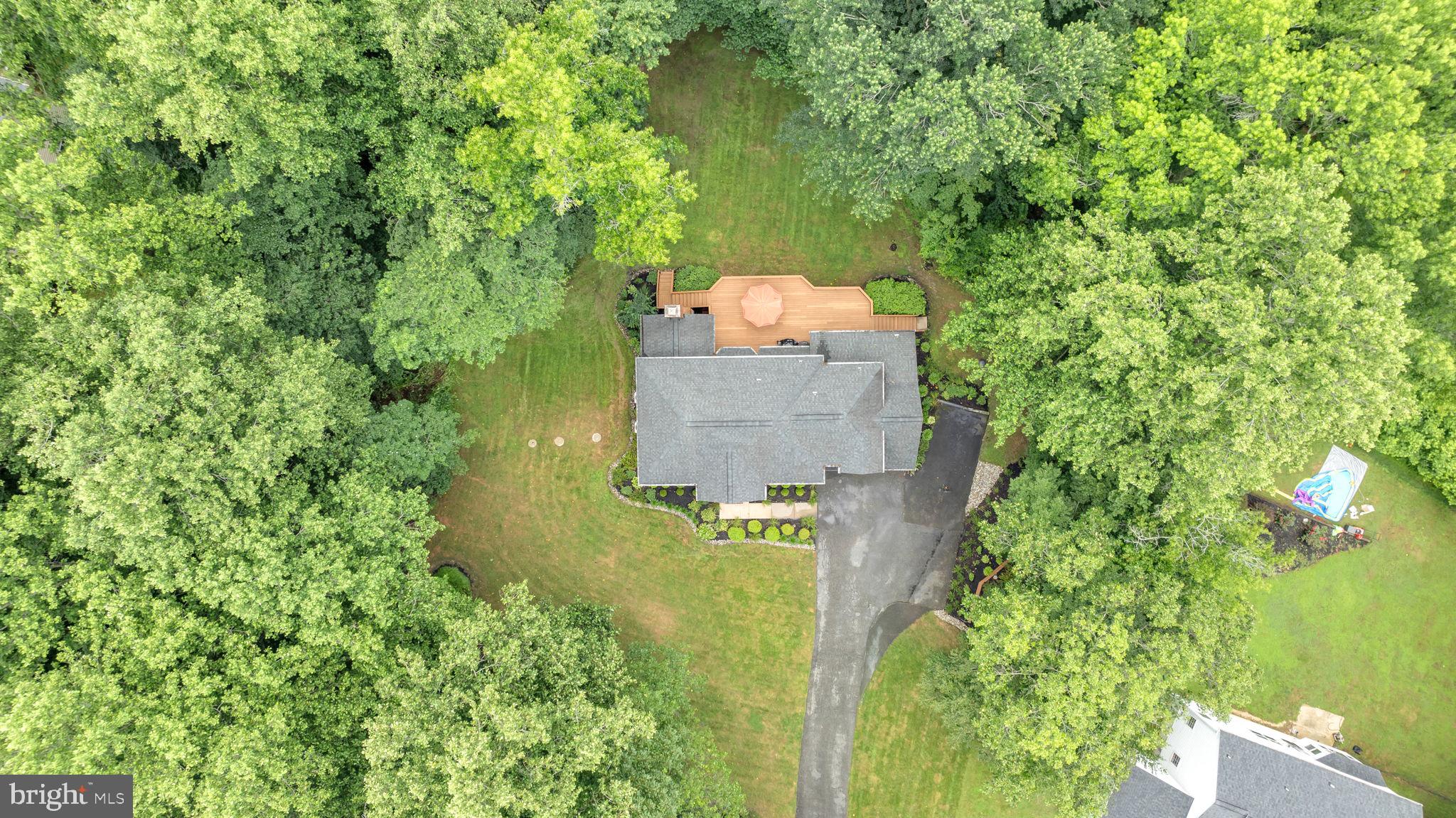 204 Walnut Creek Road Huntingtown, MD 20639 - Photo 50 of 59 an aerial view of a house with a yard