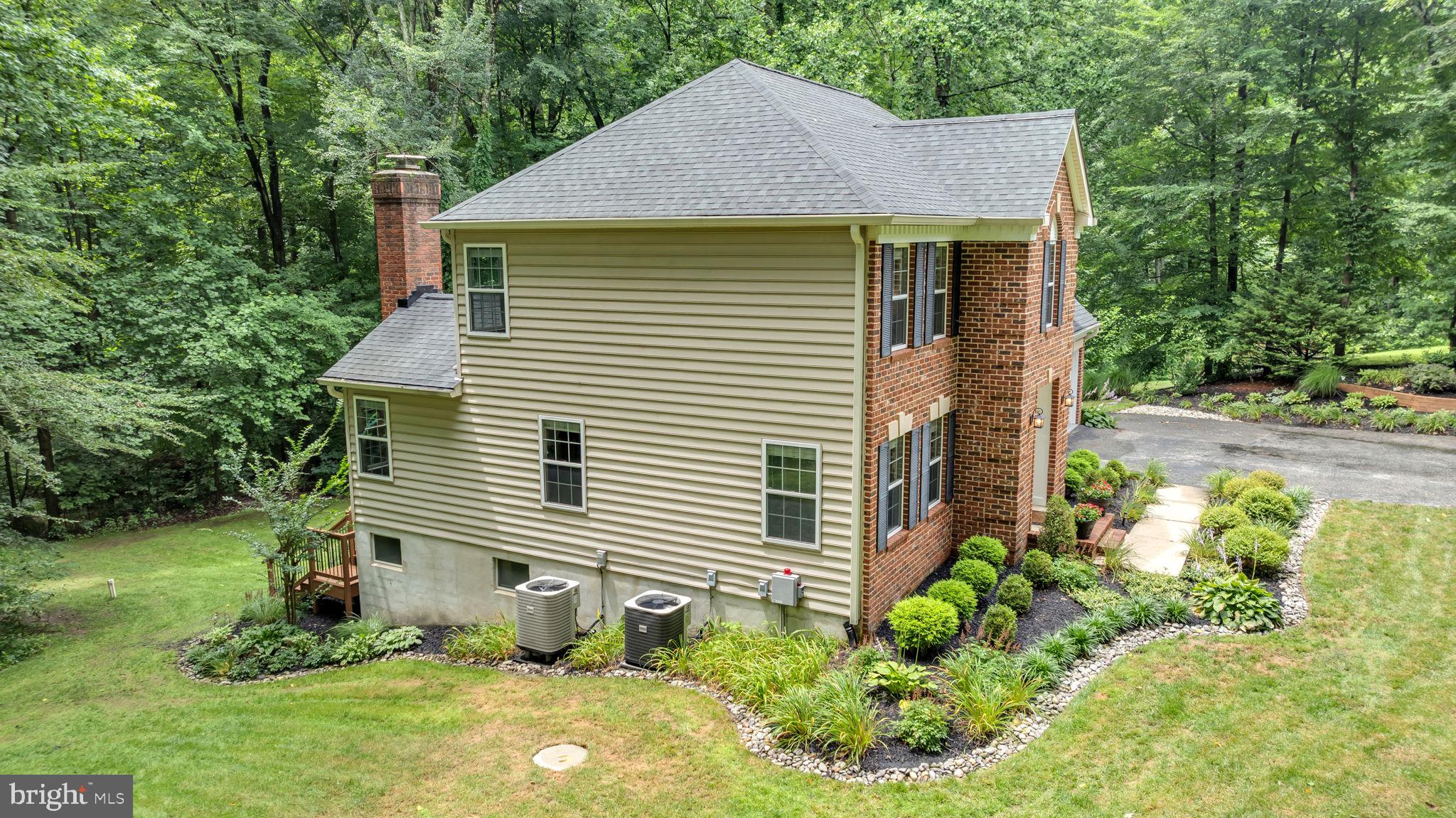 204 Walnut Creek Road Huntingtown, MD 20639 - Photo 55 of 59 a view of a house with a yard