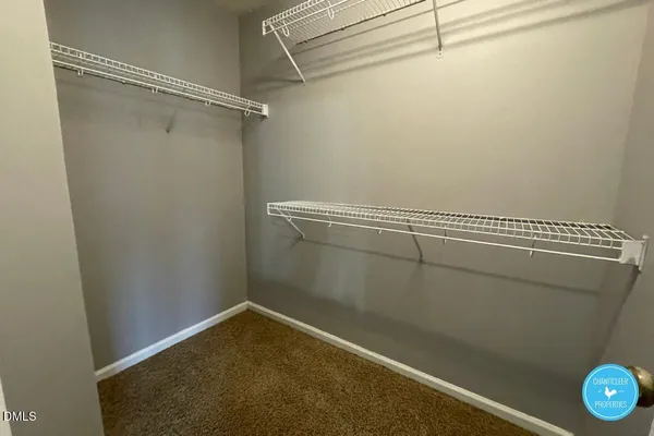 a view of a room with racks on the wall