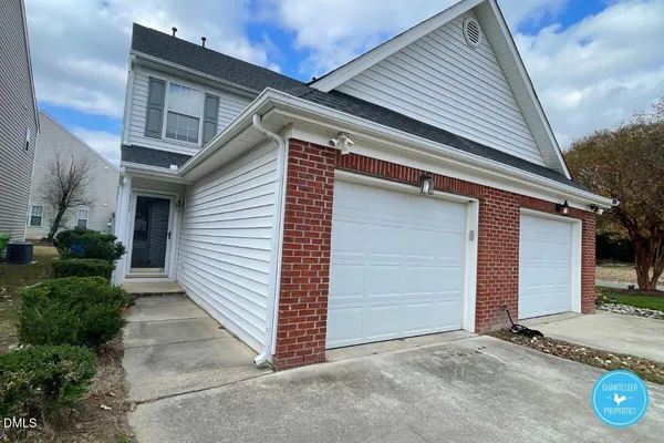 a view of a house with a garage