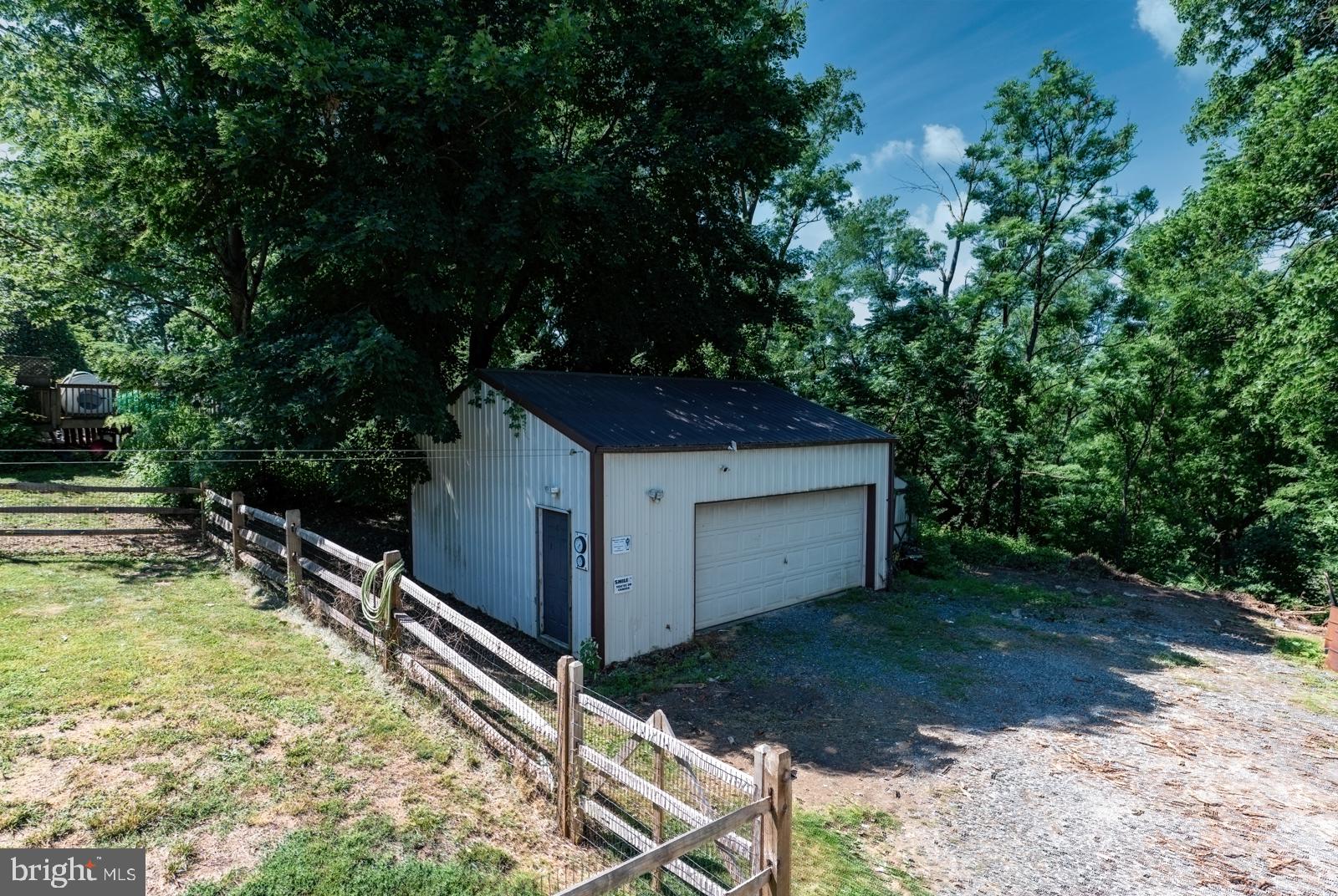 182 Rose Valley Road Pottstown, PA 19464 - Photo 13 of 52 Charming garage nestled in nature.