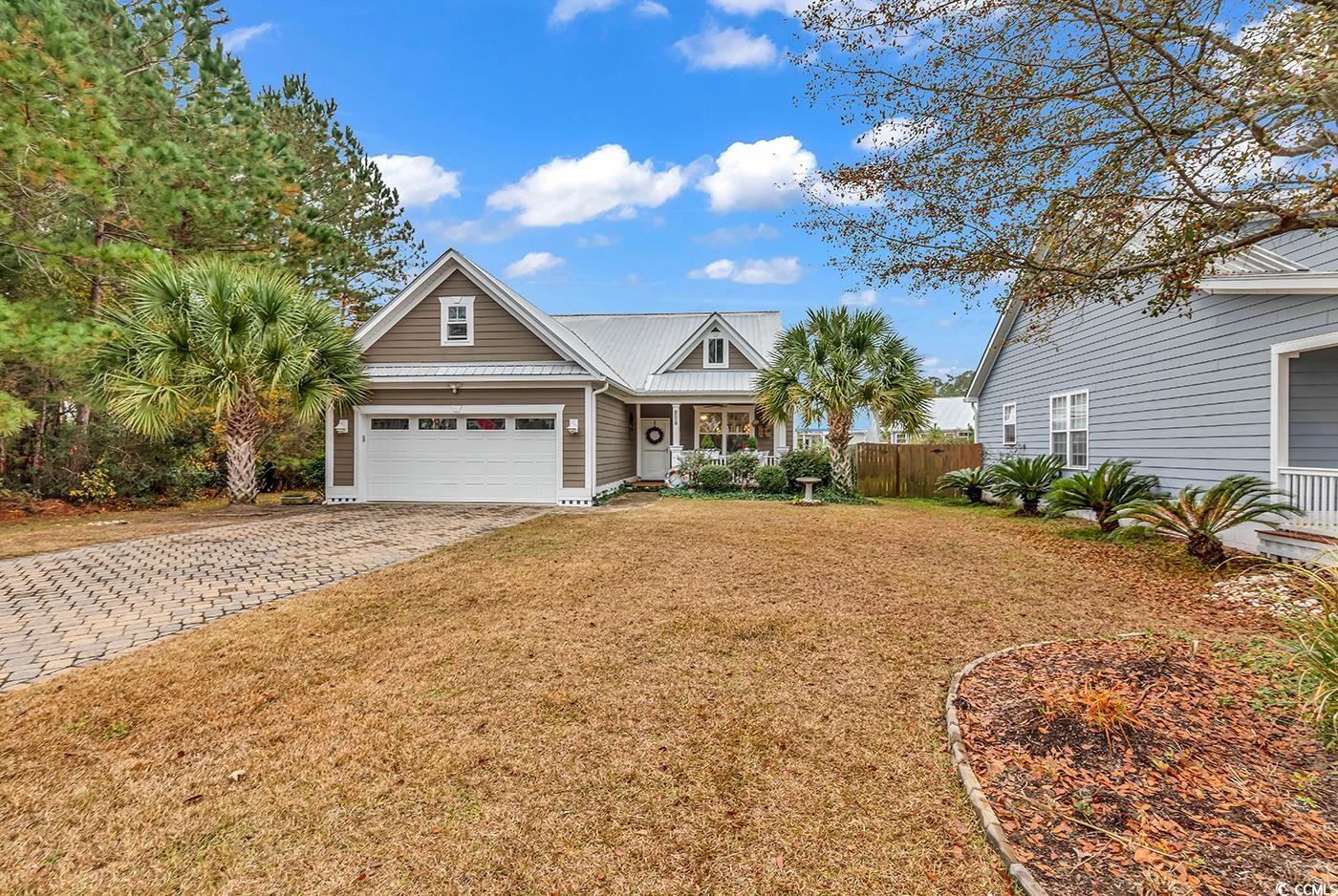 317 Goddard Lane Murrells Inlet, SC 29576 - Photo 1 of 40 View of front facade featuring a garage