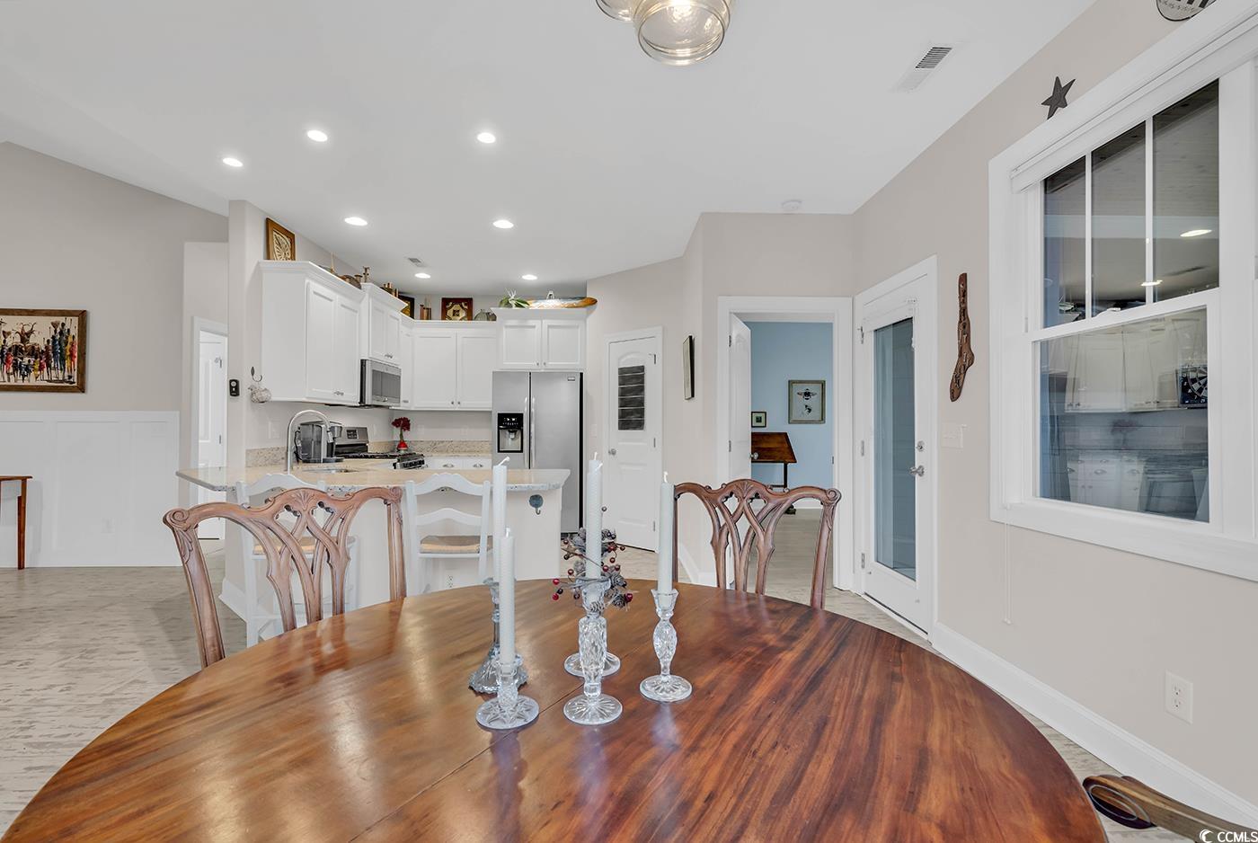317 Goddard Lane Murrells Inlet, SC 29576 - Photo 13 of 40 Dining area with sink