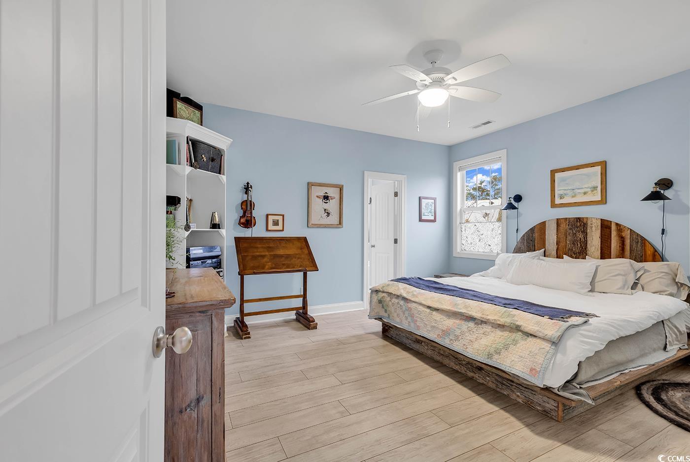 317 Goddard Lane Murrells Inlet, SC 29576 - Photo 14 of 40 Bedroom featuring light hardwood / wood-style floo