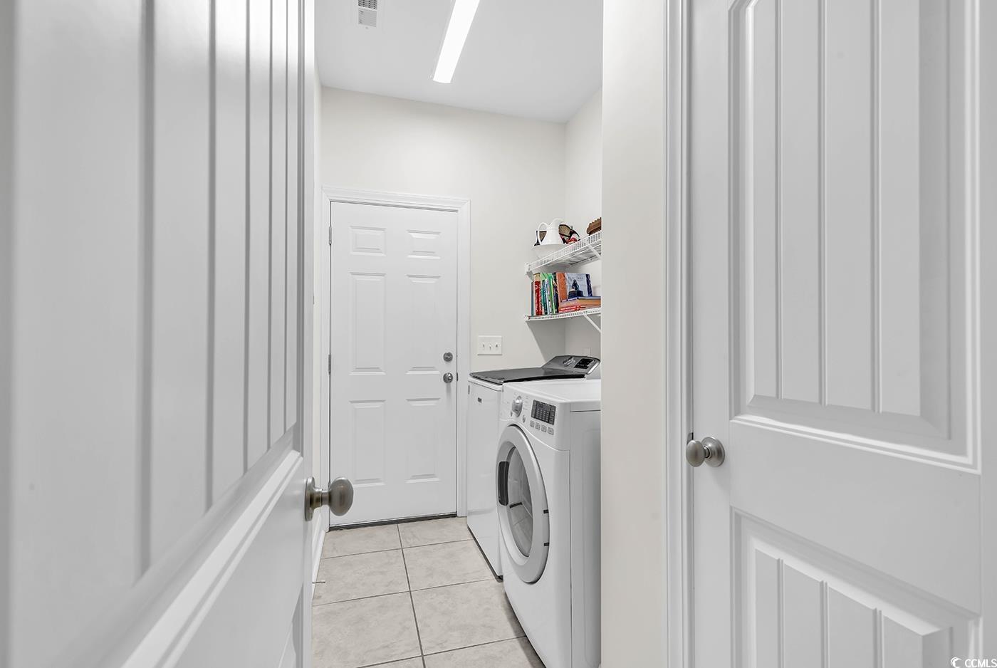 317 Goddard Lane Murrells Inlet, SC 29576 - Photo 20 of 40 Washroom with washing machine and clothes dryer an