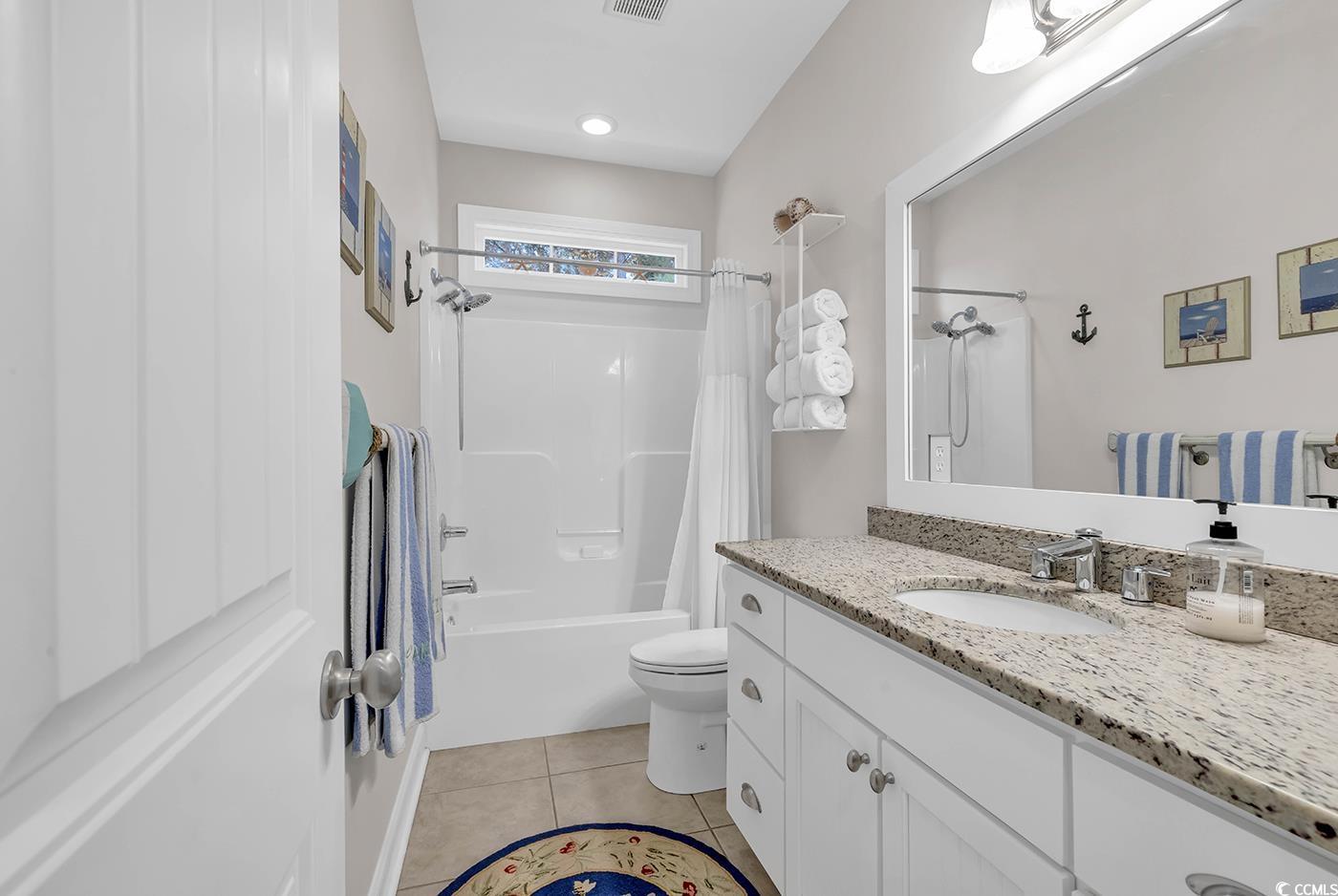 317 Goddard Lane Murrells Inlet, SC 29576 - Photo 23 of 40 Full bathroom featuring tile patterned floors, van