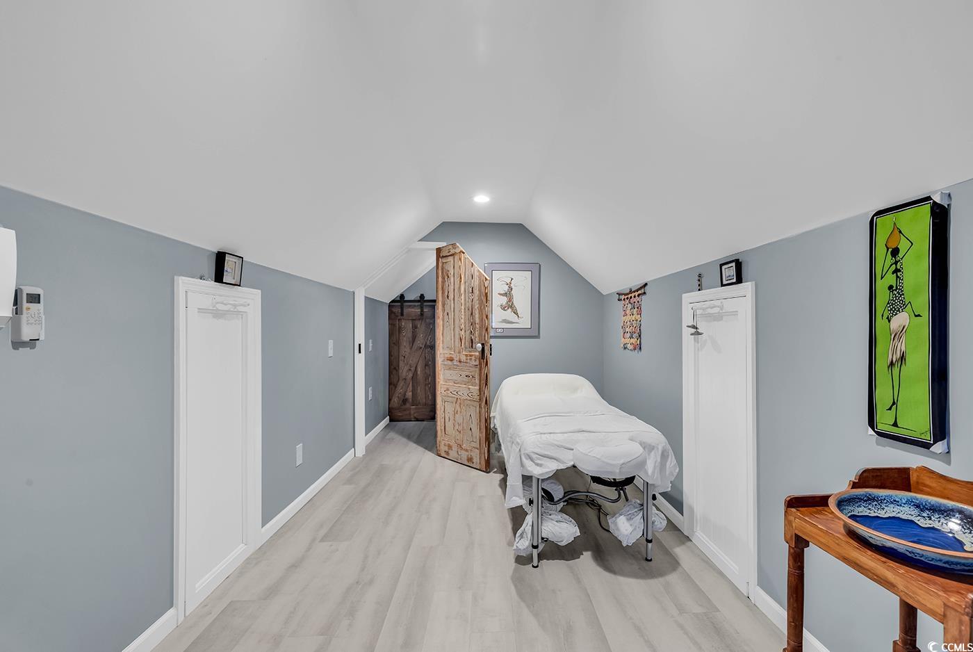 317 Goddard Lane Murrells Inlet, SC 29576 - Photo 27 of 40 Interior space with lofted ceiling and light hardw