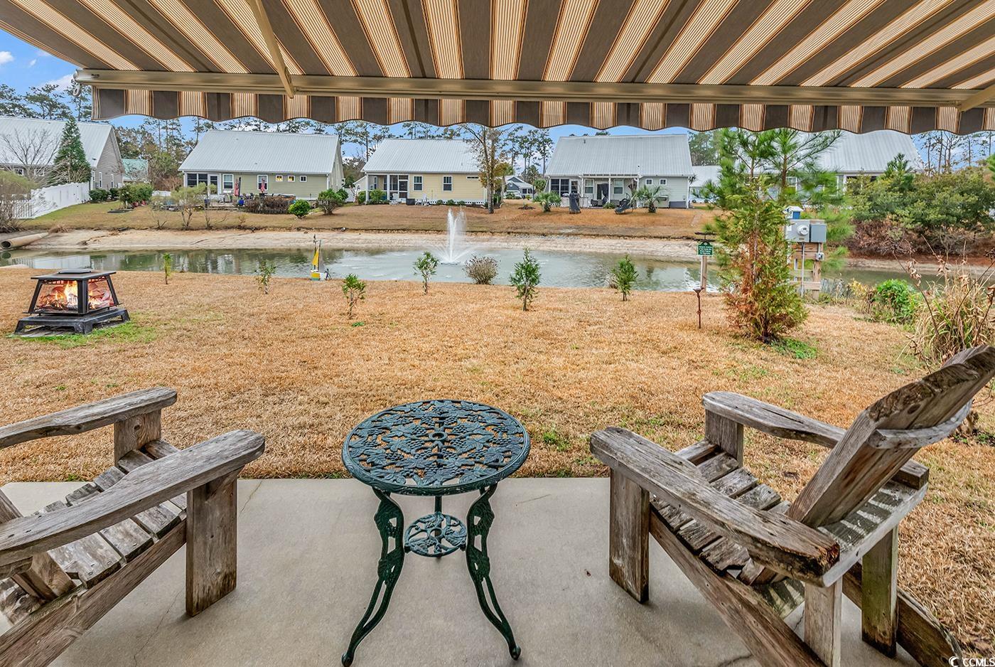 317 Goddard Lane Murrells Inlet, SC 29576 - Photo 31 of 40 View of patio / terrace with a water view