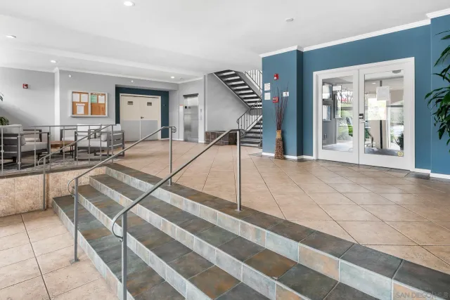 a view of an entryway with livingroom