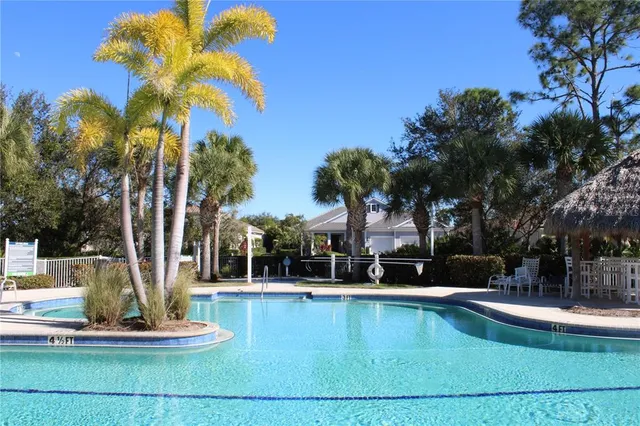 a view of a house with swimming pool