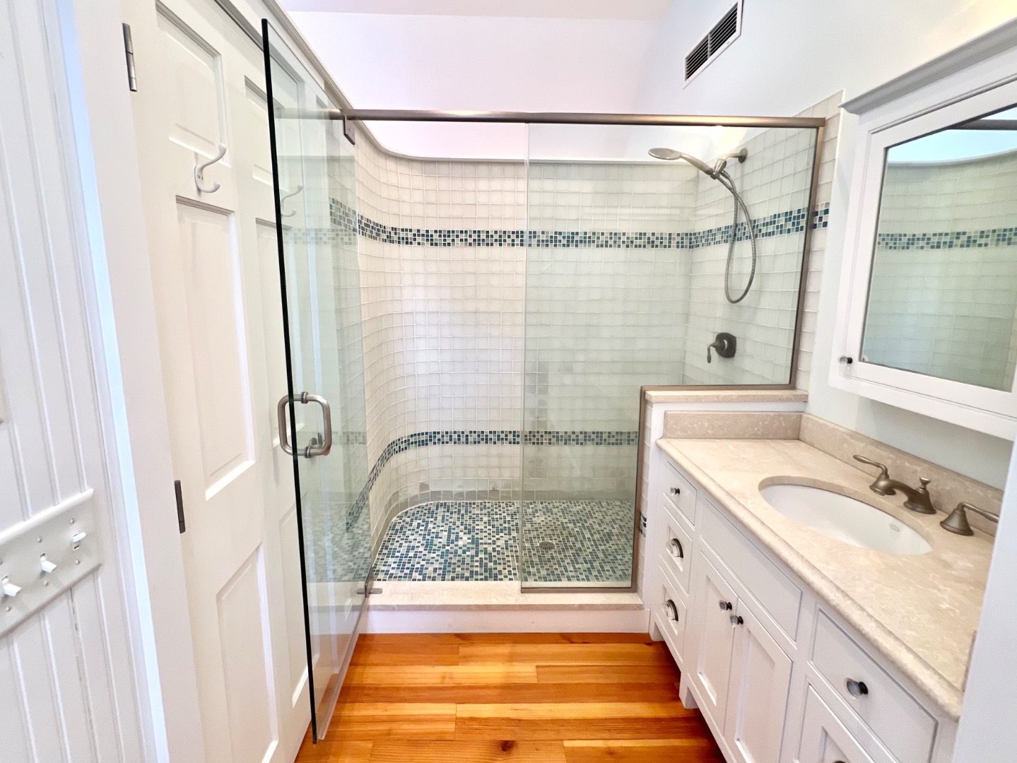 209 Cove Road Vineyard Haven, MA 02568 - Photo 53 of 81 a bathroom with a granite countertop sink and a shower