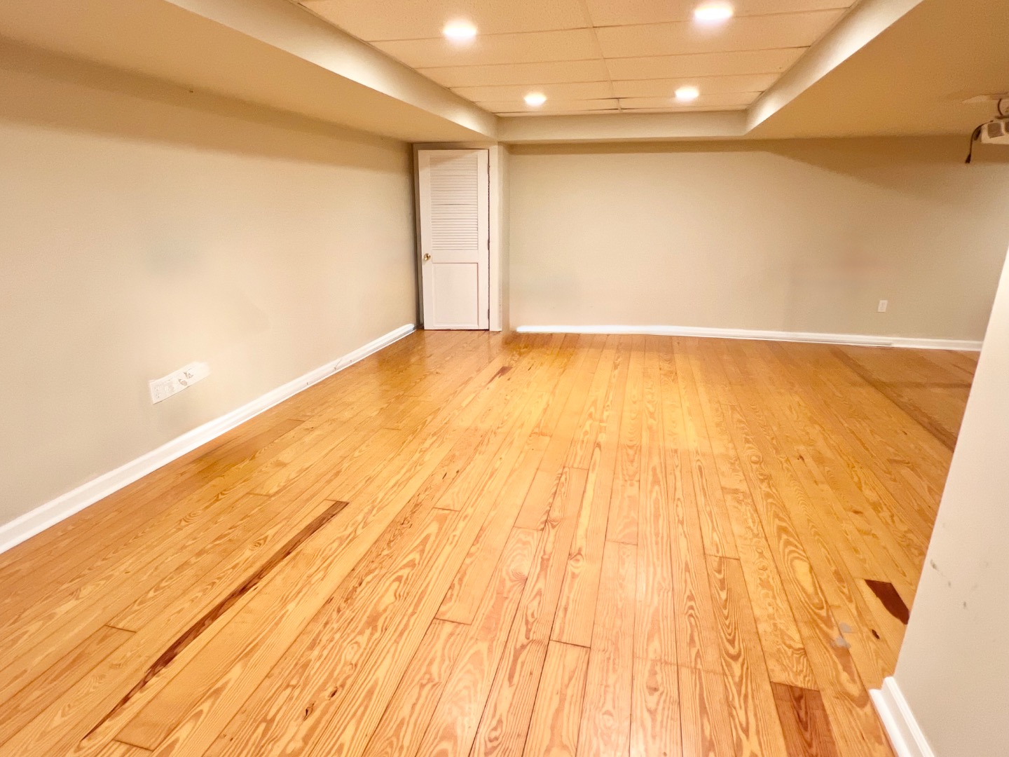 209 Cove Road Vineyard Haven, MA 02568 - Photo 70 of 81 a view of empty room with wooden floor