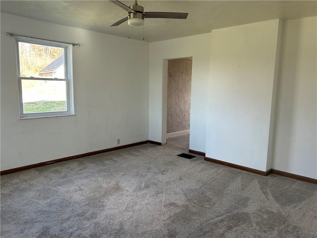 556 Bonniebrook Road Butler, PA 16002 - Photo 13 of 36 an empty room with a window