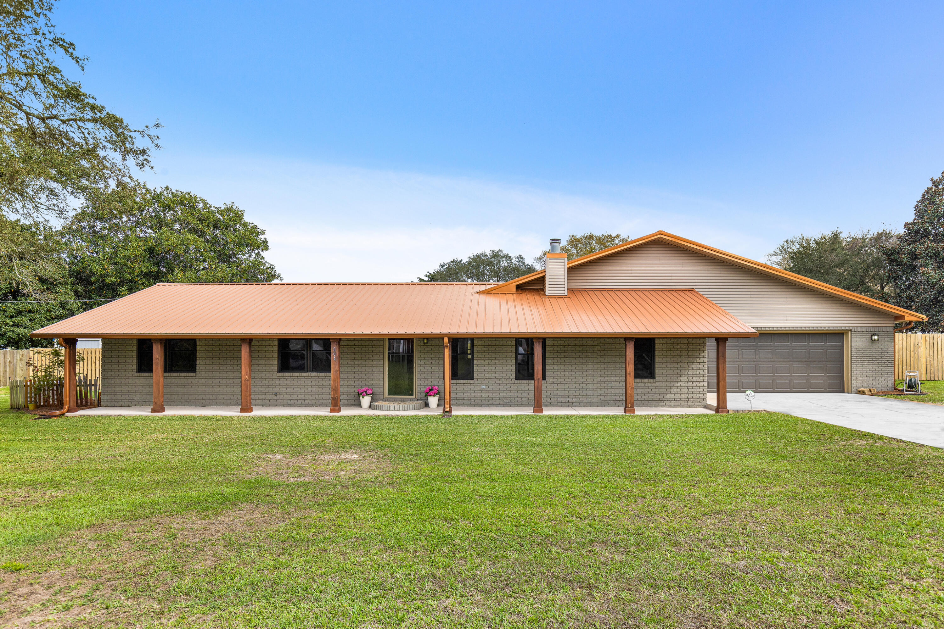 804 Mars Street Destin, FL 32541 - Photo 1 of 71 a front view of house with yard and green space