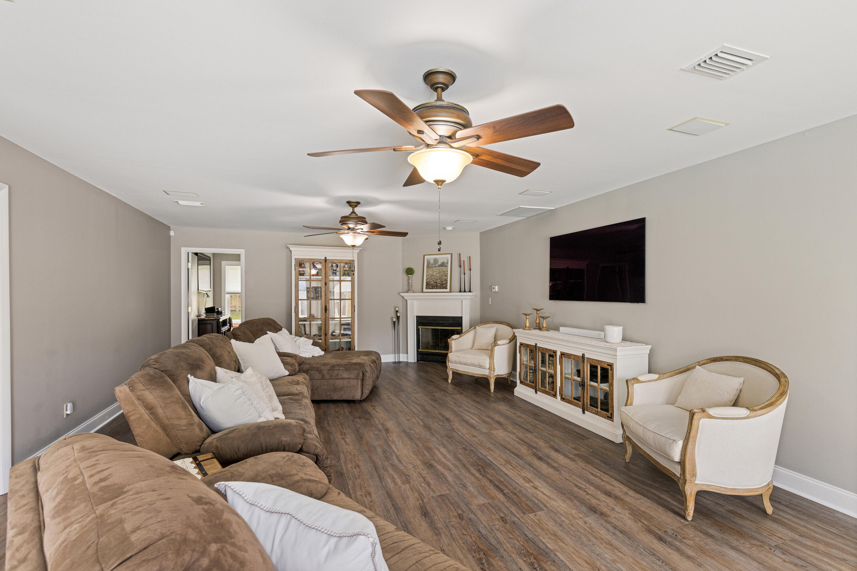 804 Mars Street Destin, FL 32541 - Photo 13 of 71 a living room with furniture and a flat screen tv