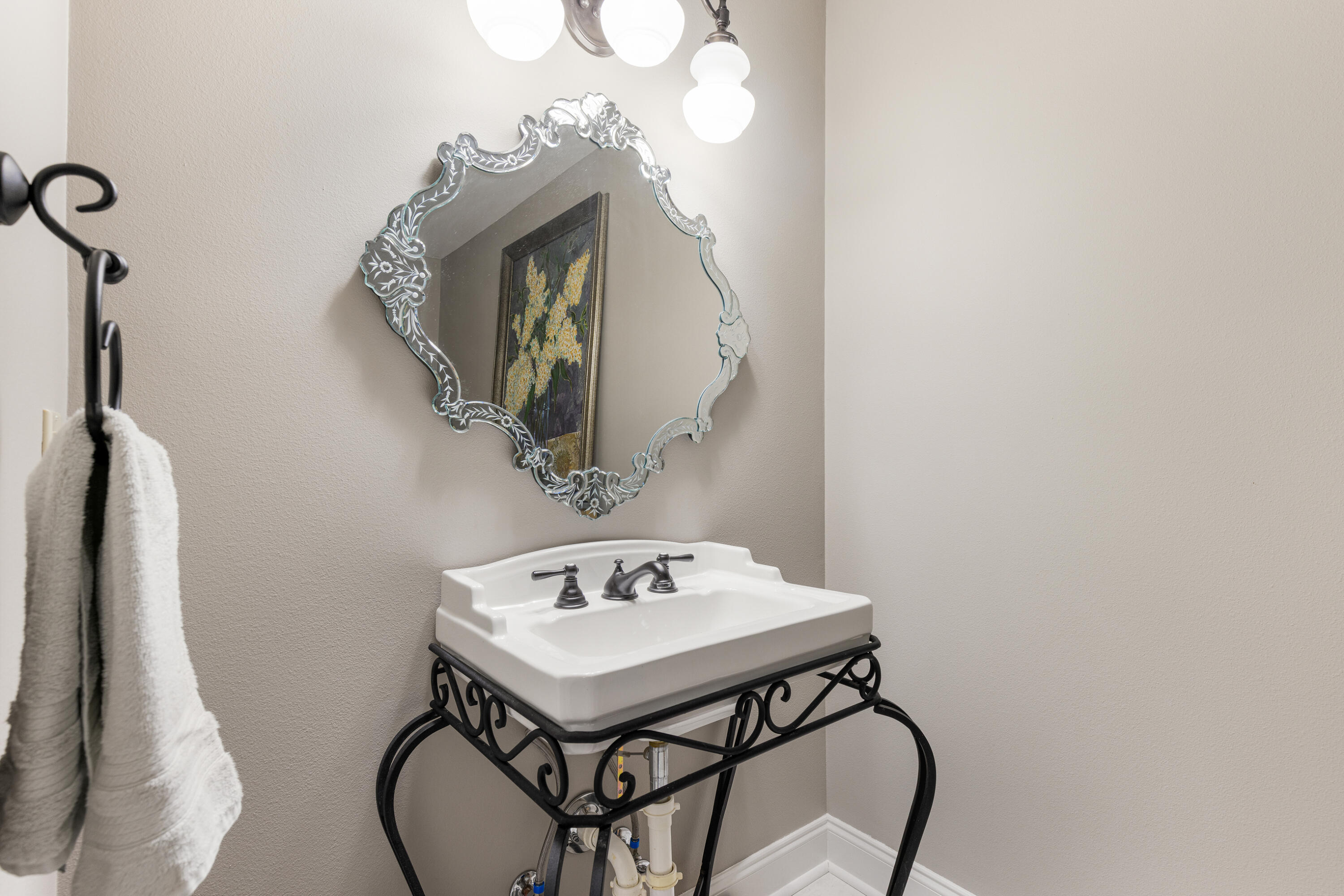 804 Mars Street Destin, FL 32541 - Photo 16 of 71 a bathroom with a sink a mirror and a toilet