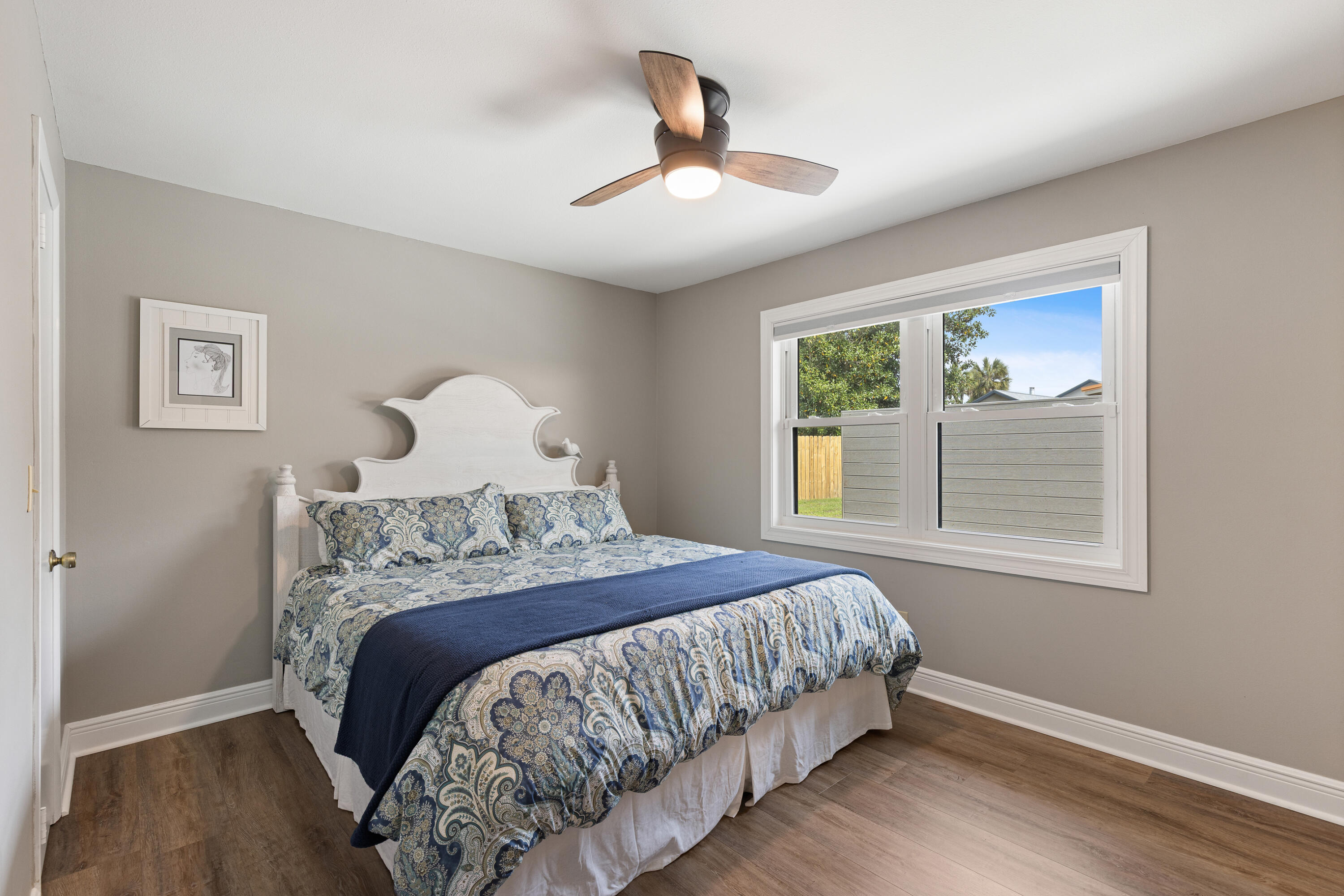804 Mars Street Destin, FL 32541 - Photo 27 of 71 a bedroom with a bed and a window