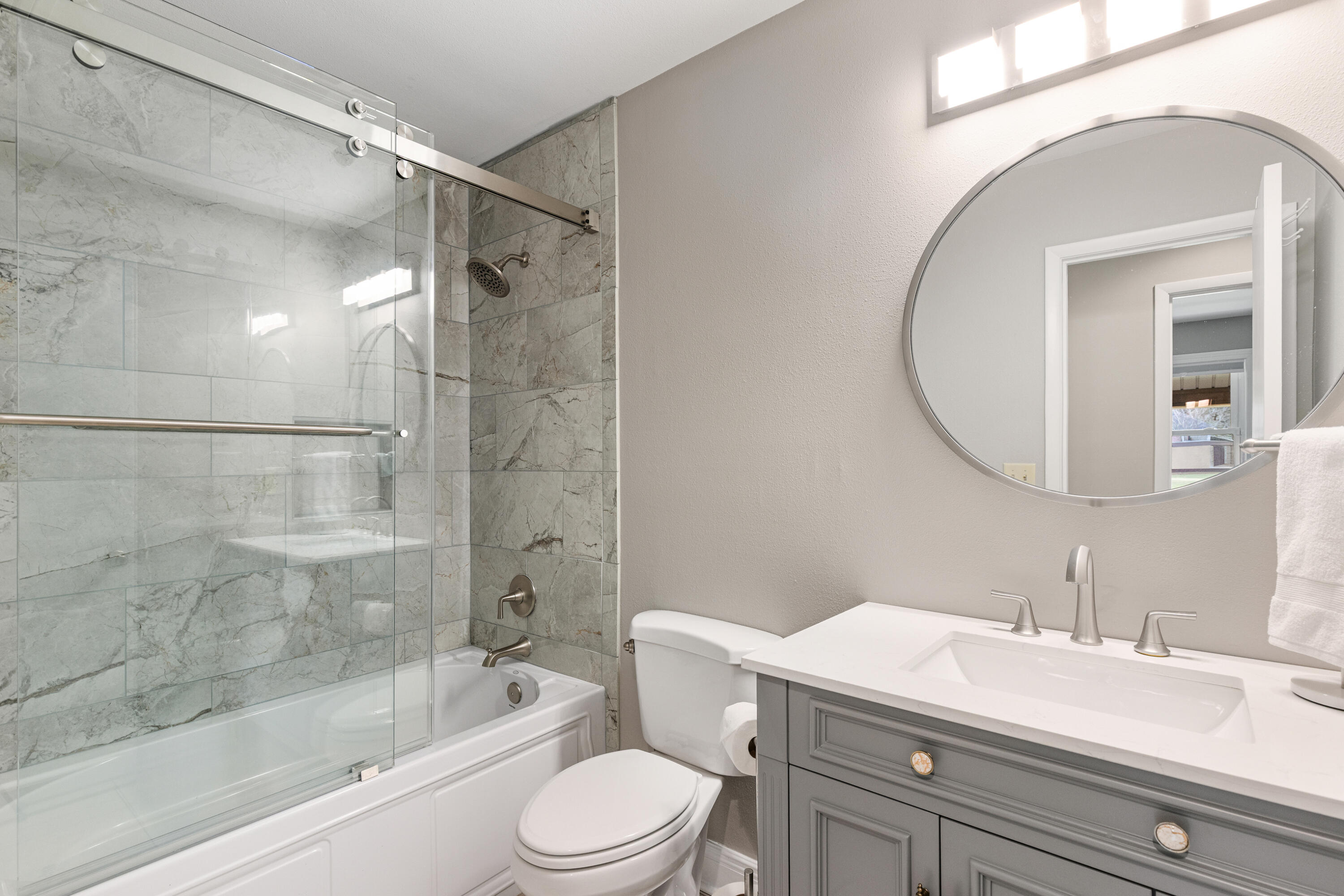 804 Mars Street Destin, FL 32541 - Photo 32 of 71 a bathroom with a sink a toilet and shower