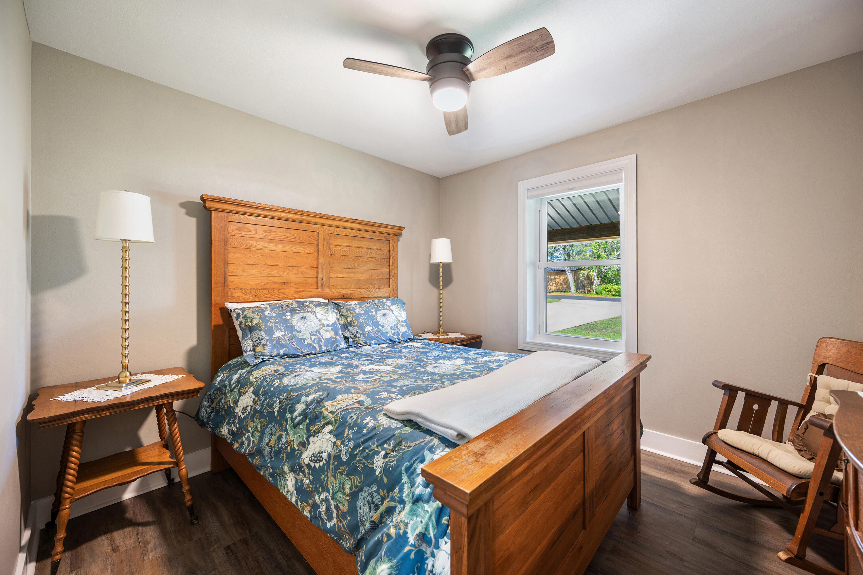 804 Mars Street Destin, FL 32541 - Photo 35 of 71 a bedroom with a bed and a chair