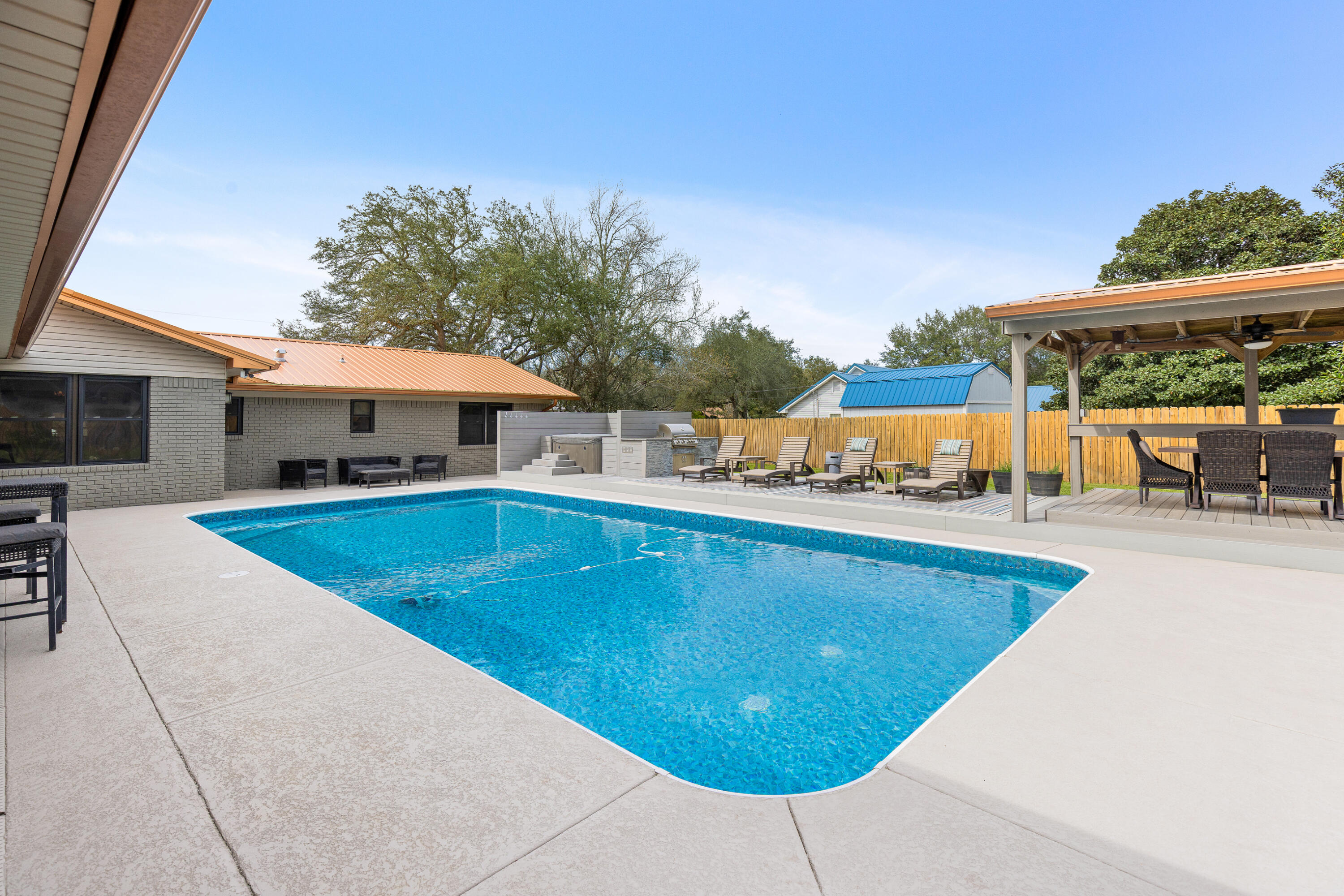 804 Mars Street Destin, FL 32541 - Photo 45 of 71 an outdoor space with swimming pool and furniture