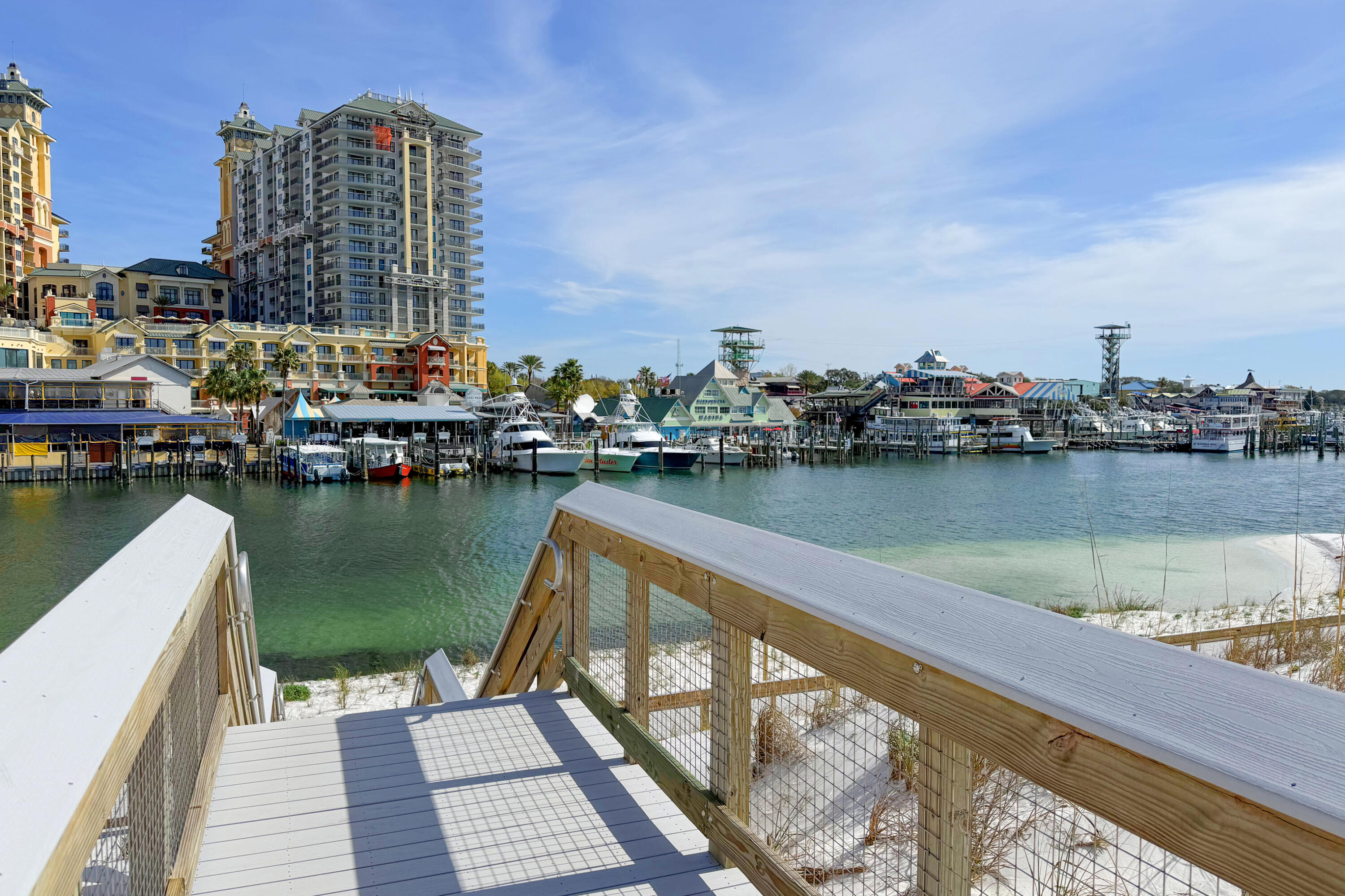 804 Mars Street Destin, FL 32541 - Photo 61 of 71 a view of a lake with tall buildings