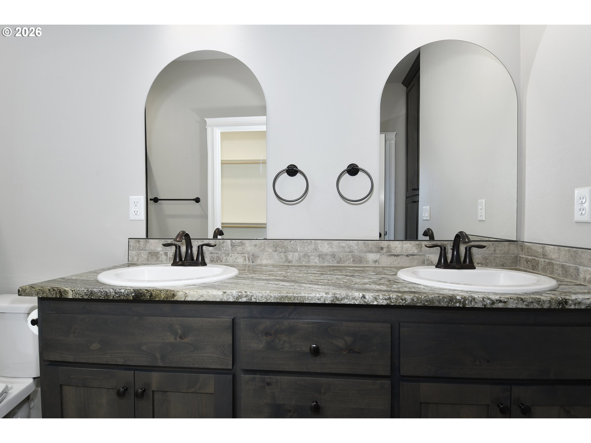 443 Northeast Pine Street Sublimity, OR 97385 - Photo 14 of 26 a bathroom with a granite countertop sink and a mirror
