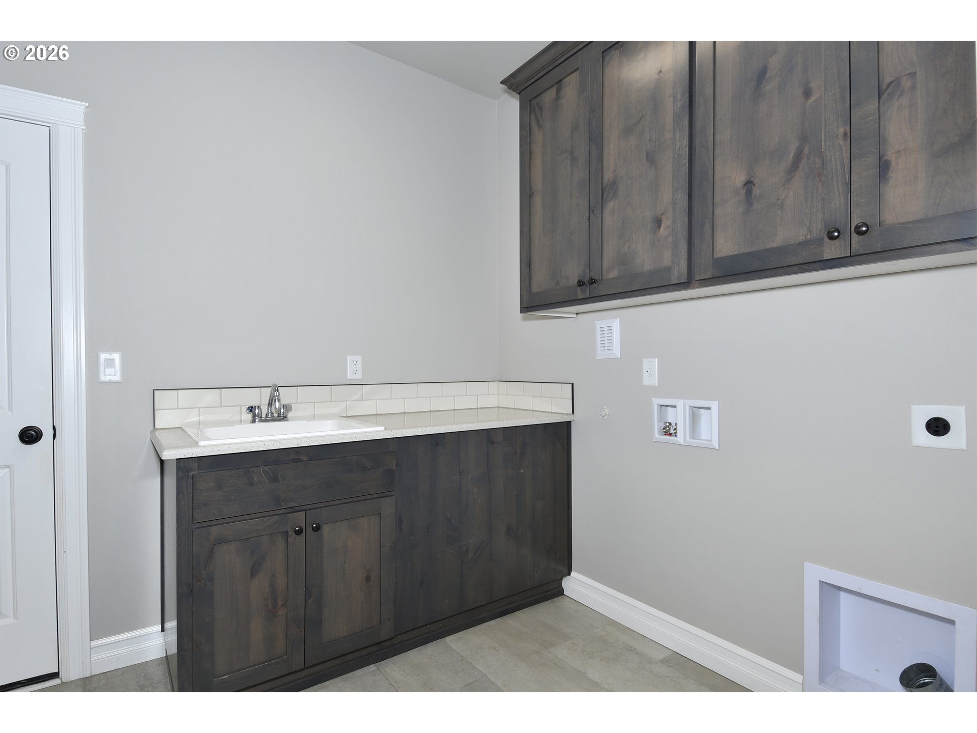 443 Northeast Pine Street Sublimity, OR 97385 - Photo 16 of 26 a bathroom with a sink and cabinets