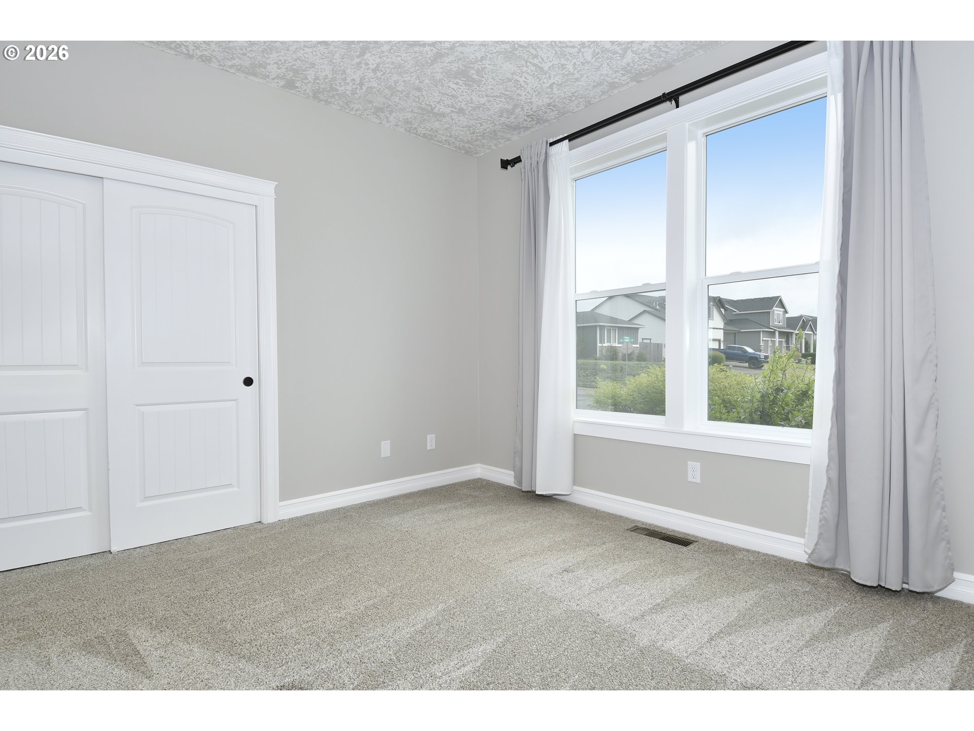 443 Northeast Pine Street Sublimity, OR 97385 - Photo 17 of 26 a view of an empty room with a window