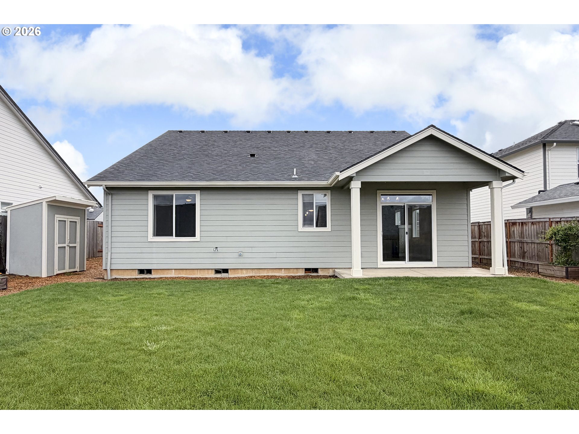 443 Northeast Pine Street Sublimity, OR 97385 - Photo 20 of 26 a front view of a house with a garden