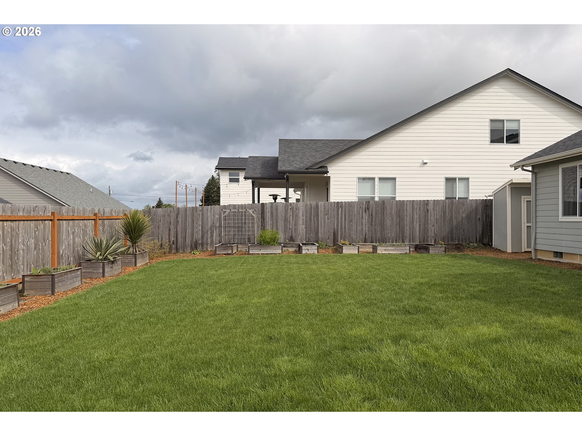 443 Northeast Pine Street Sublimity, OR 97385 - Photo 23 of 26 a view of a backyard