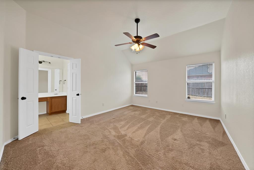 2832 Lone Ranger Trail Little Elm, TX 75068 - Photo 18 of 35 a view of an empty room with a window