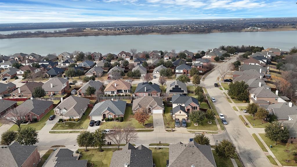 2832 Lone Ranger Trail Little Elm, TX 75068 - Photo 32 of 35 an aerial view of a city with lake view