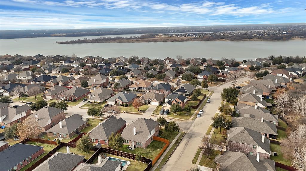 2832 Lone Ranger Trail Little Elm, TX 75068 - Photo 33 of 35 an aerial view of a building with outdoor space