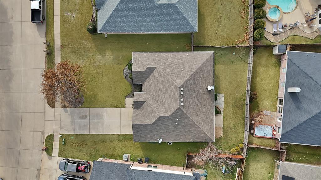 2832 Lone Ranger Trail Little Elm, TX 75068 - Photo 5 of 35 an aerial view of a house with a swimming pool