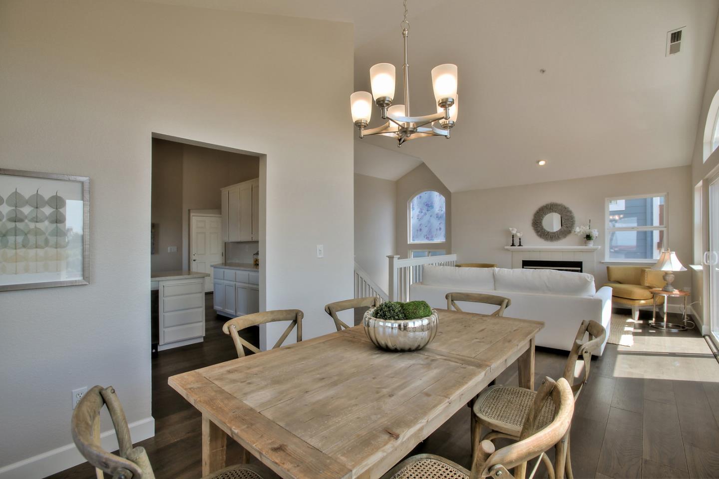 518 A Monterey Road Pacifica, CA 94044 - Photo 12 of 41 a view of a dining room with furniture and wooden floor