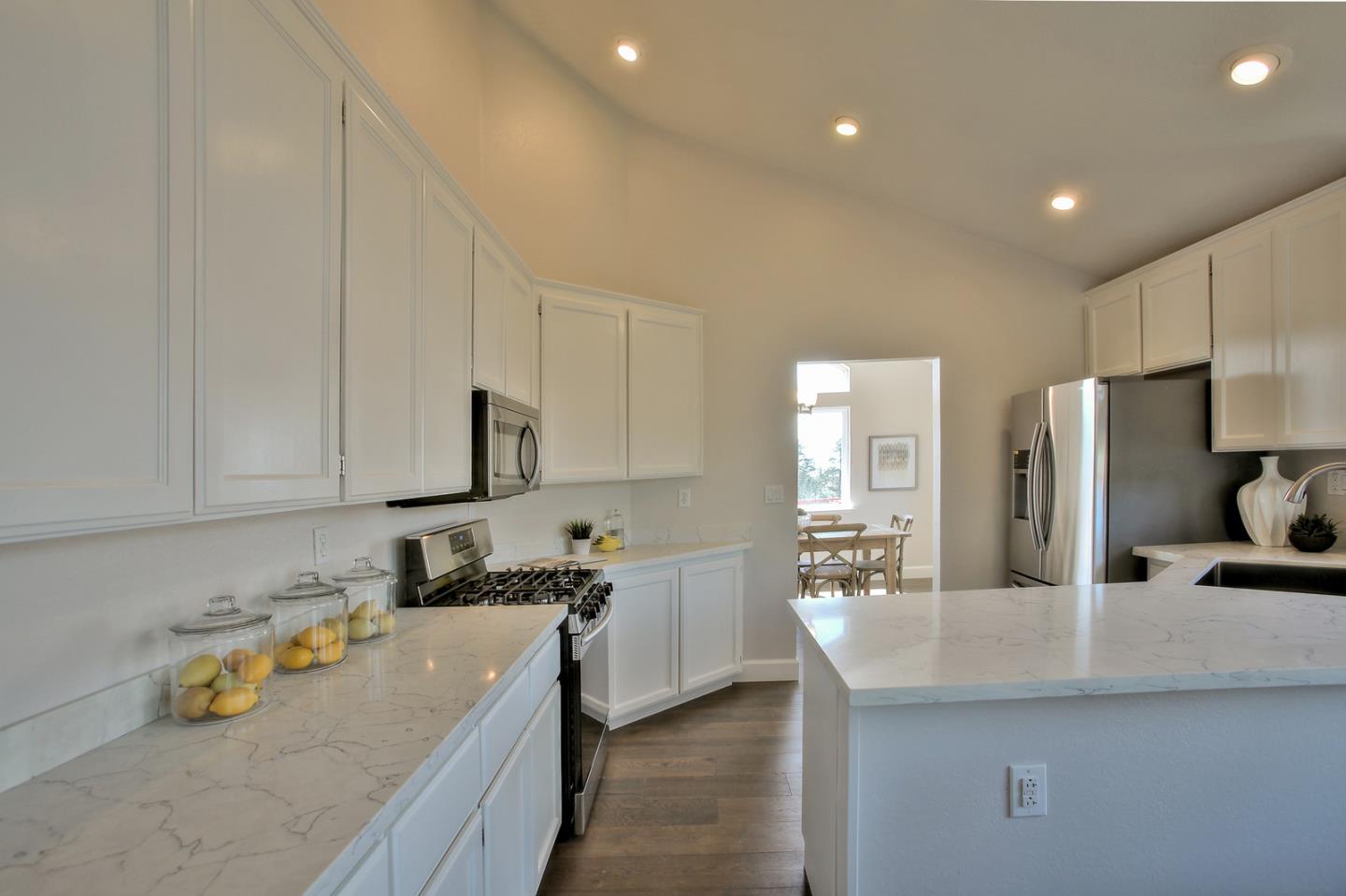 518 A Monterey Road Pacifica, CA 94044 - Photo 17 of 41 a kitchen with refrigerator and cabinets