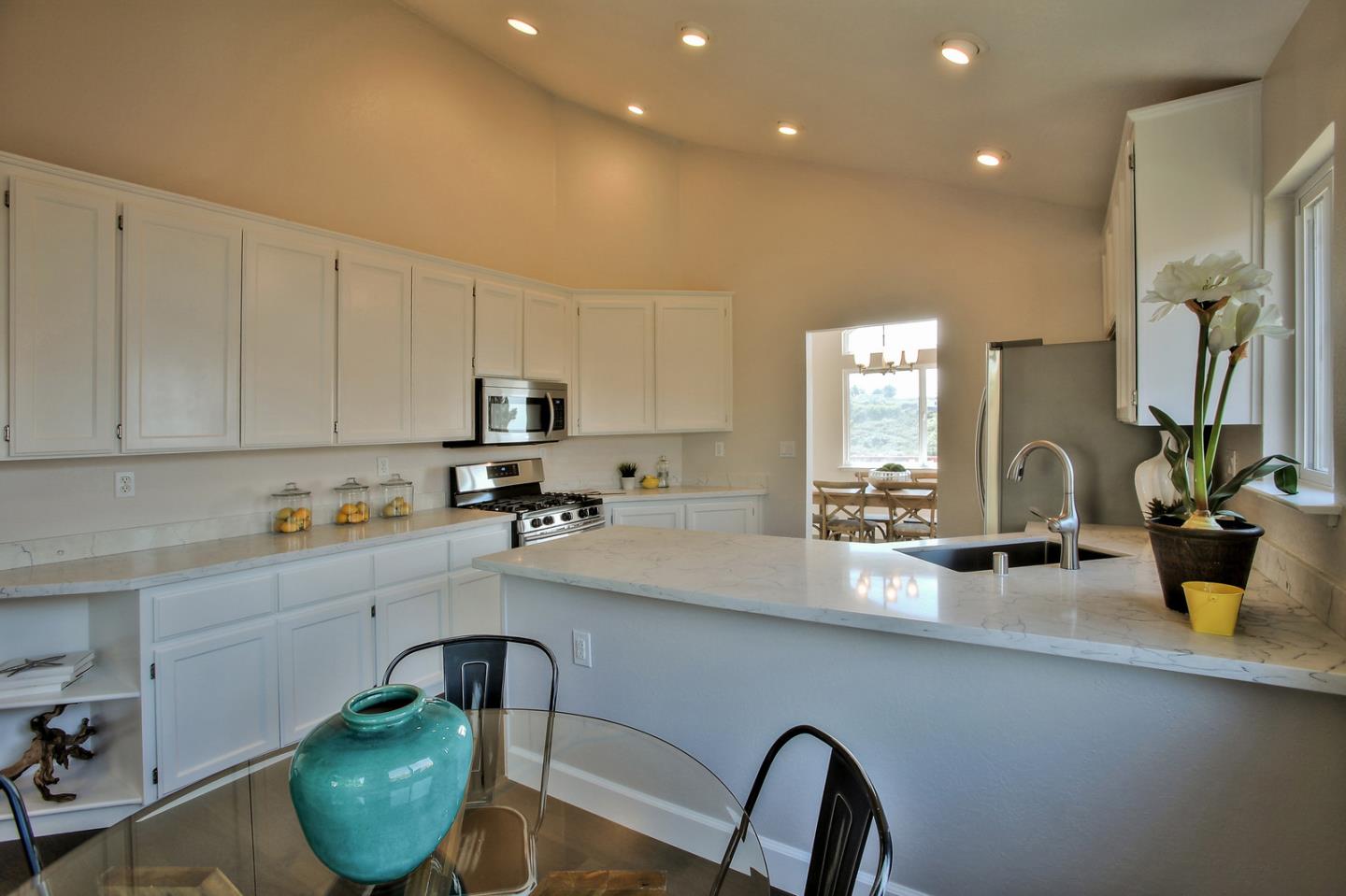 518 A Monterey Road Pacifica, CA 94044 - Photo 18 of 41 a kitchen with a sink and cabinets