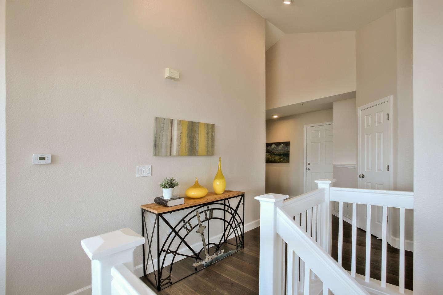 518 A Monterey Road Pacifica, CA 94044 - Photo 21 of 41 a bedroom with furniture and wooden floor