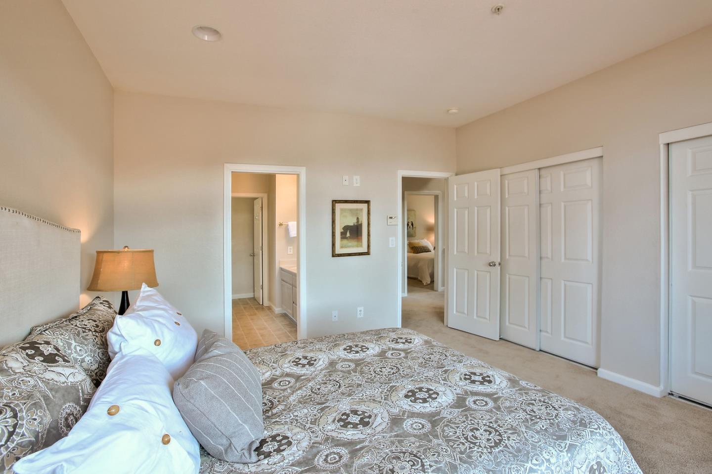 518 A Monterey Road Pacifica, CA 94044 - Photo 25 of 41 a bedroom with a bed and a dresser