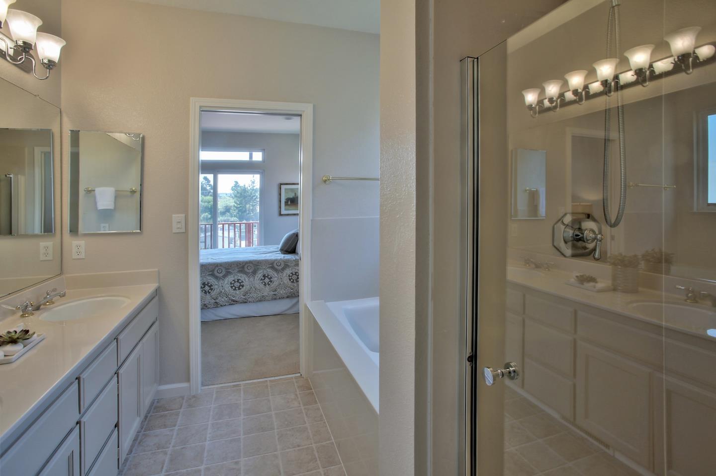 518 A Monterey Road Pacifica, CA 94044 - Photo 28 of 41 a bathroom with a sink a tub and a mirror