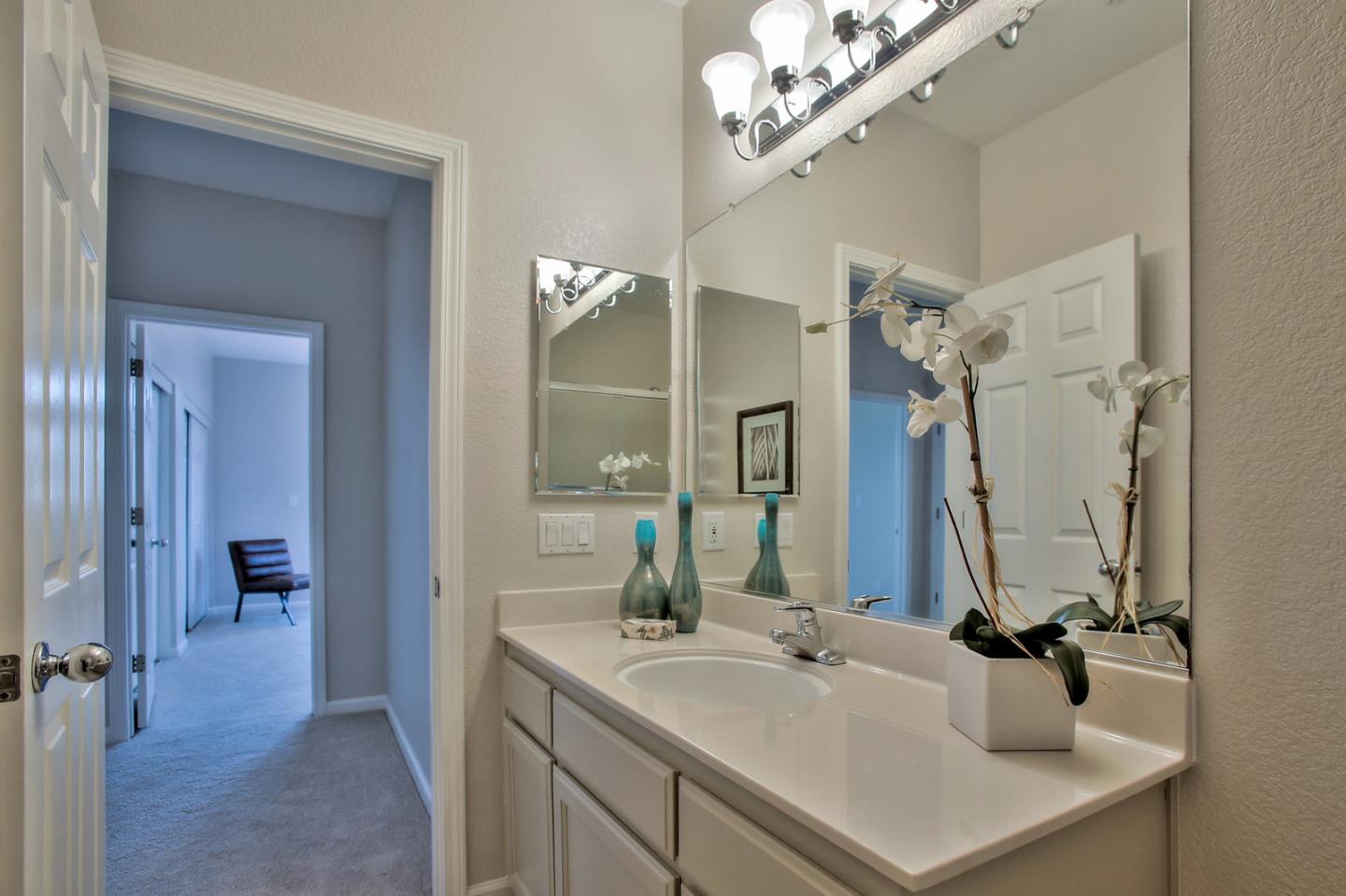 518 A Monterey Road Pacifica, CA 94044 - Photo 32 of 41 a bathroom with a sink double vanity and a mirror