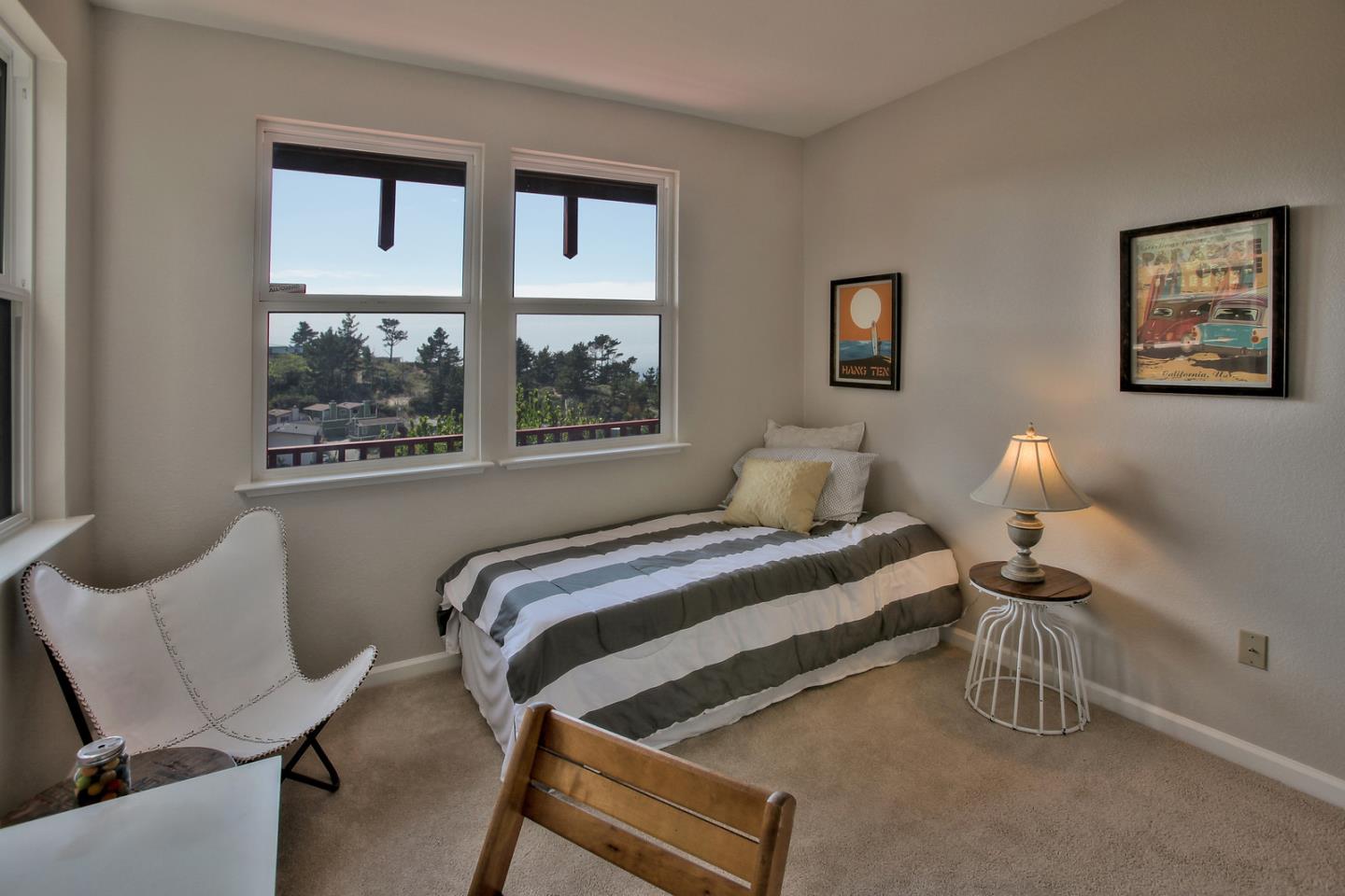 518 A Monterey Road Pacifica, CA 94044 - Photo 34 of 41 a bedroom with a bed and a window