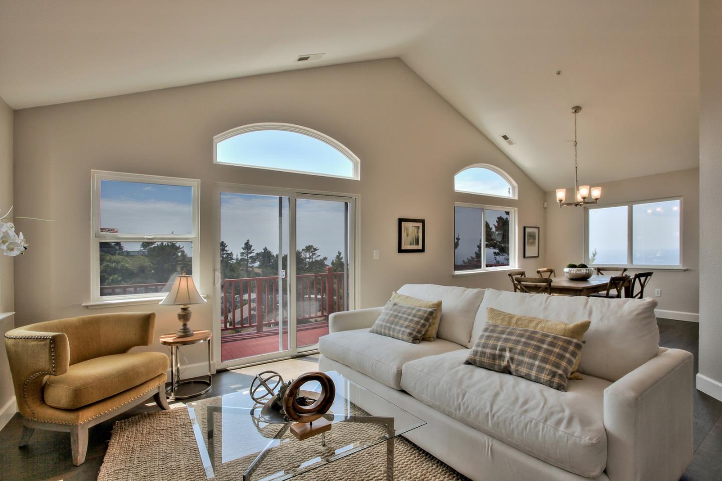 518 A Monterey Road Pacifica, CA 94044 - Photo 6 of 41 a living room with furniture and a large window