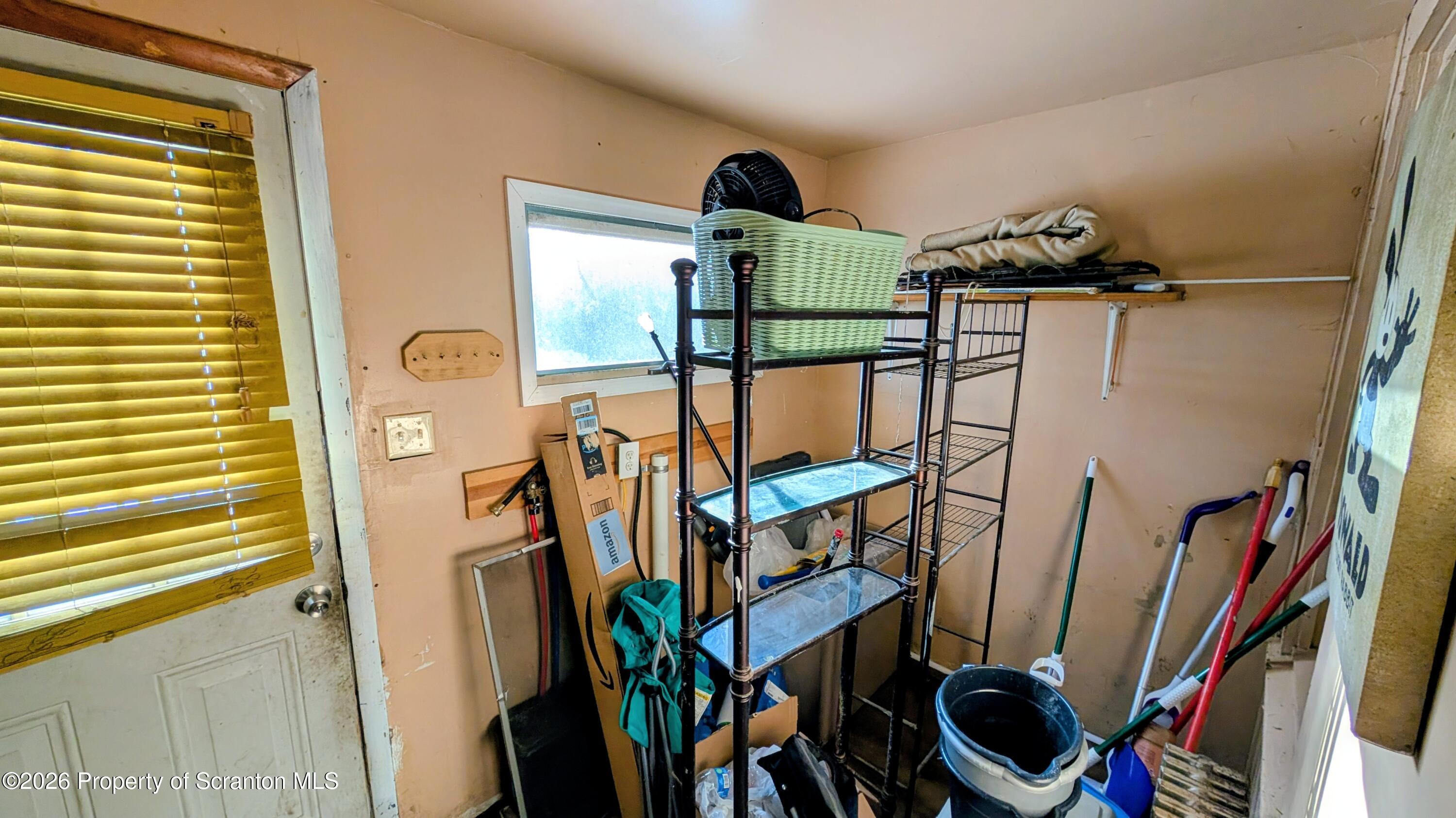 509 Main Street Duryea, PA 18642 - Photo 14 of 30 a view of walk in closet with clothes and shoes